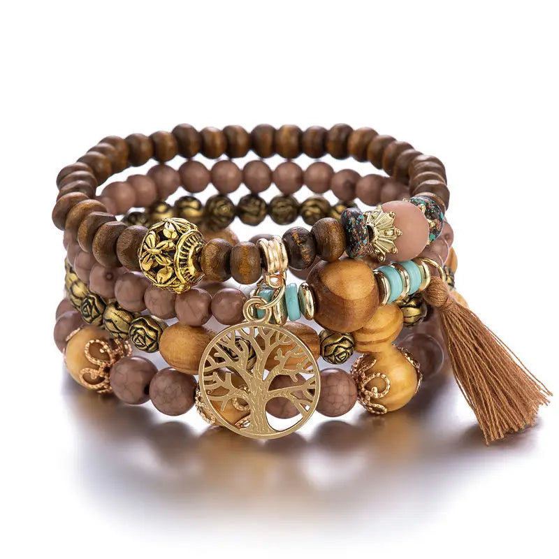 Ensemble de 4 bracelets éthique  en bois avec charme "arbre de vie"